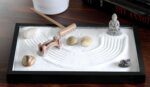 Nature's Mark Mini Zen Garden Kit for Desk with Rake, White Sand, Buddha Figures, Bridge Figure and River Rocks, Black Rectangle Base - Image 2