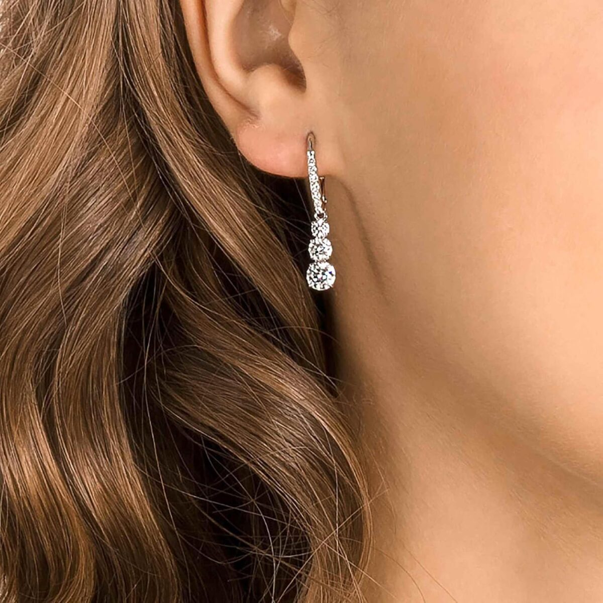 Swarovski Stilla Attract Trilogy Drop Pierced Earrings with White Crystals on a Rhodium Plated Setting with Hinged Closure - Image 6
