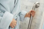 Moen Brushed Nickel Bathroom Safety 24-Inch Designer Safety Shower Grab Bar with Curled Grip for Handicapped or Elderly, LR8724D3GBN - Image 2